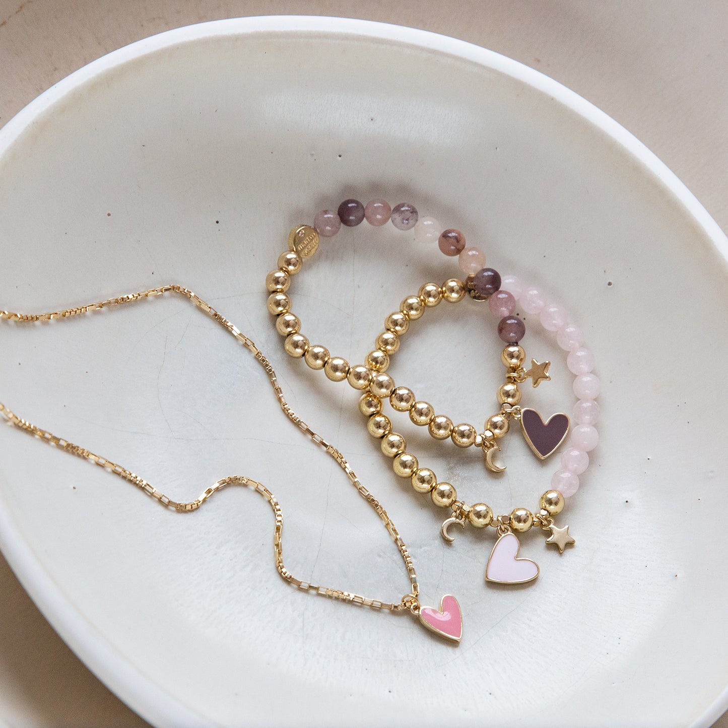 rose quartz enamel heart charm beaded bracelet