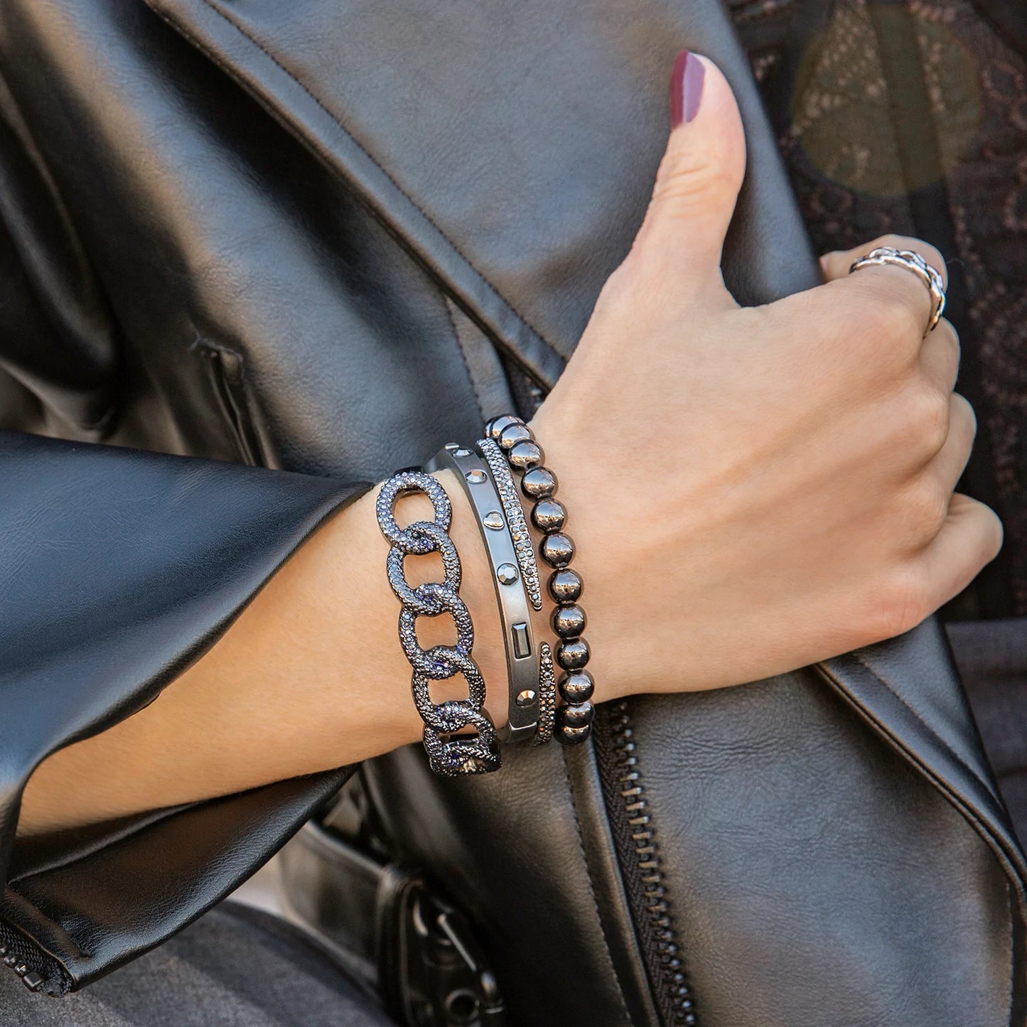 pave link statement hinge bangle