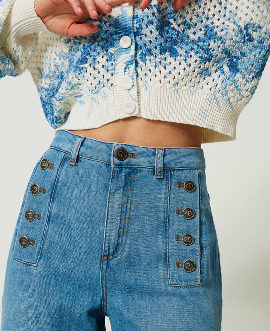 Flared jeans with decorative buttons