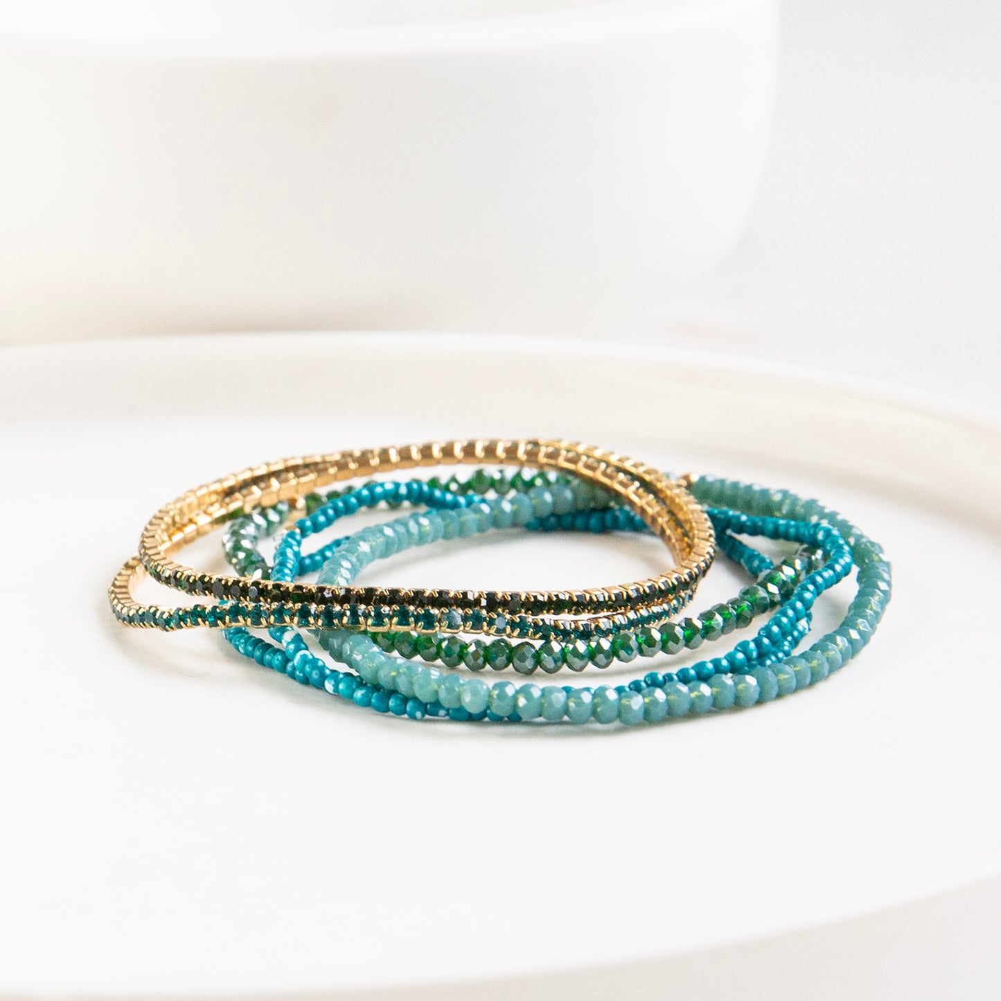 teal multi strand bracelet stack